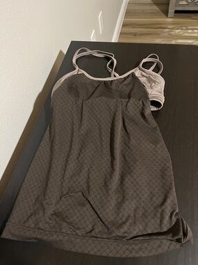 Women's grey workout tank top with built-in bra
